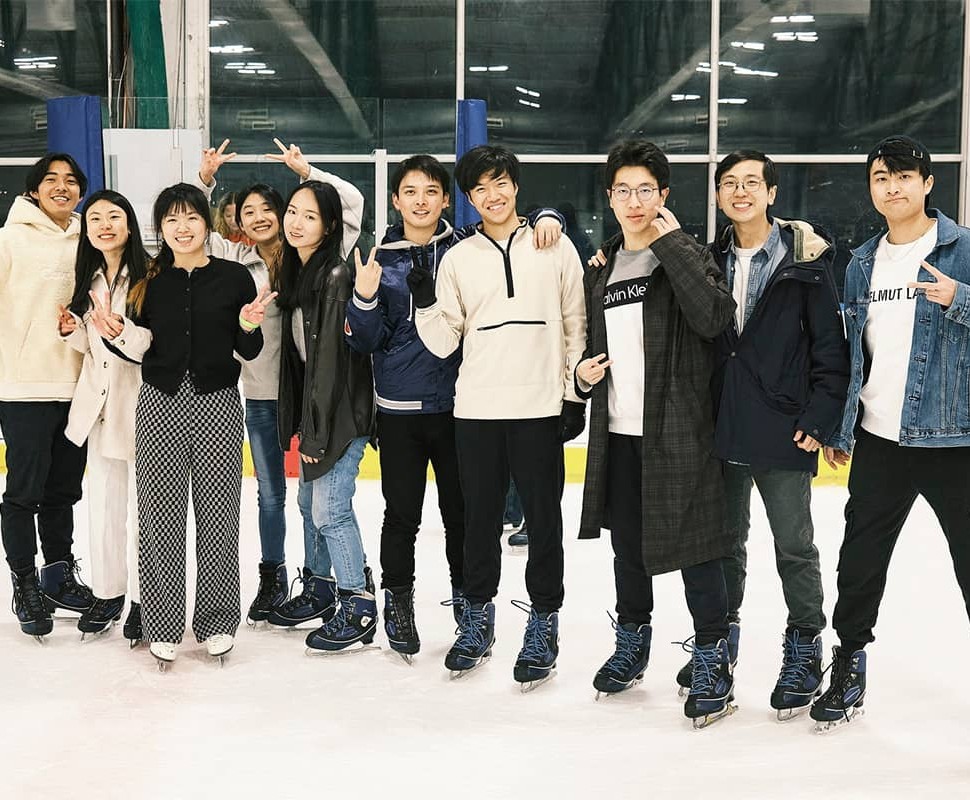 Group of students posing in an ice skating rink