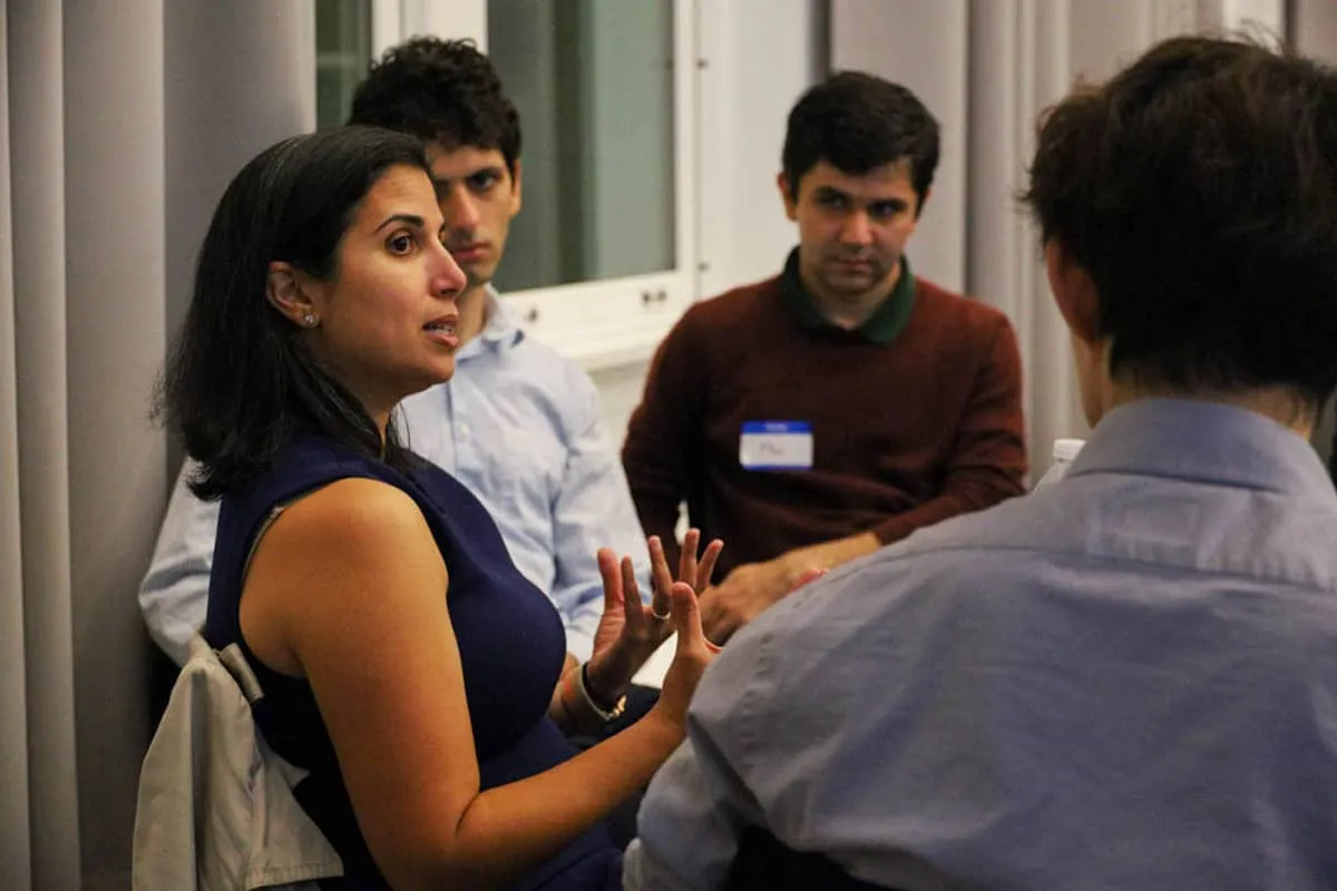 IEOR faculty and doctoral students collaborating on a project