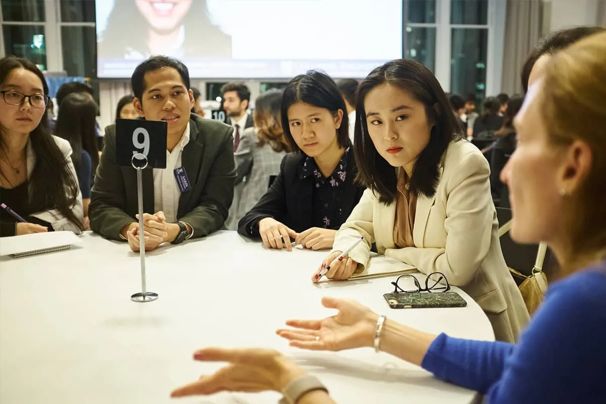 Group of people sitting at a table