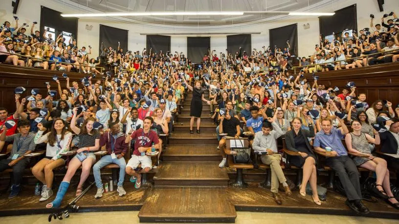 Dean Boyce and the Class of 2022 show off the traditional beanies handed out to Columbia Engineering first year students.