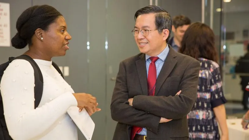 Electrical engineer Christine Hendon (left) was promoted to associate professor on tenure track. Vice Dean Shi-Fu Chang (right) recognized the School’s 13 new faculty members.