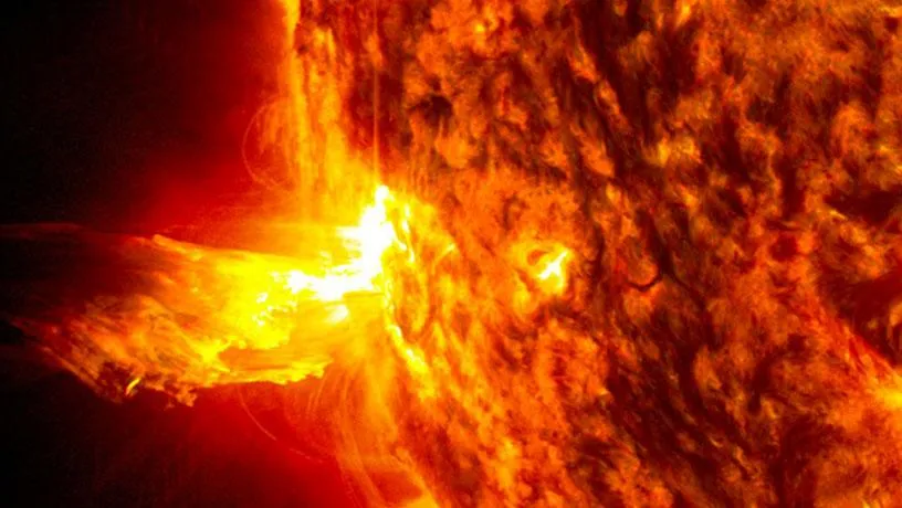 This image shows the bright light of a solar flare on the left side of the sun and an eruption of solar material shooting through the sun’s atmosphere, called a prominence eruption. Shortly thereafter, this same region of the sun sent a coronal mass ejection out into space.