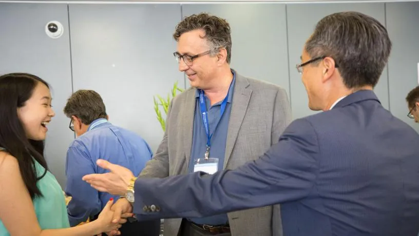 Prof. Alan West at one of the several events where faculty and alumni mingled throughout the weekend.